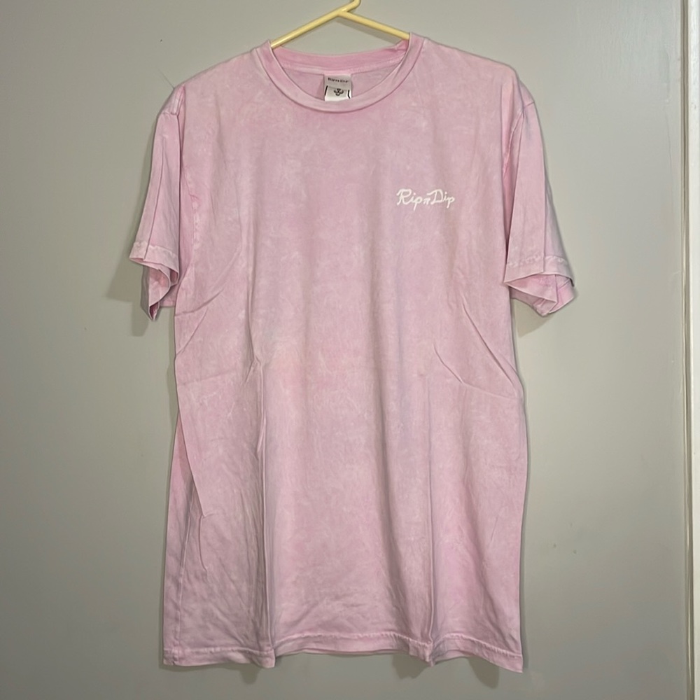 Pink RipnDip short sleeve tee with Dandelion Nermel on back
